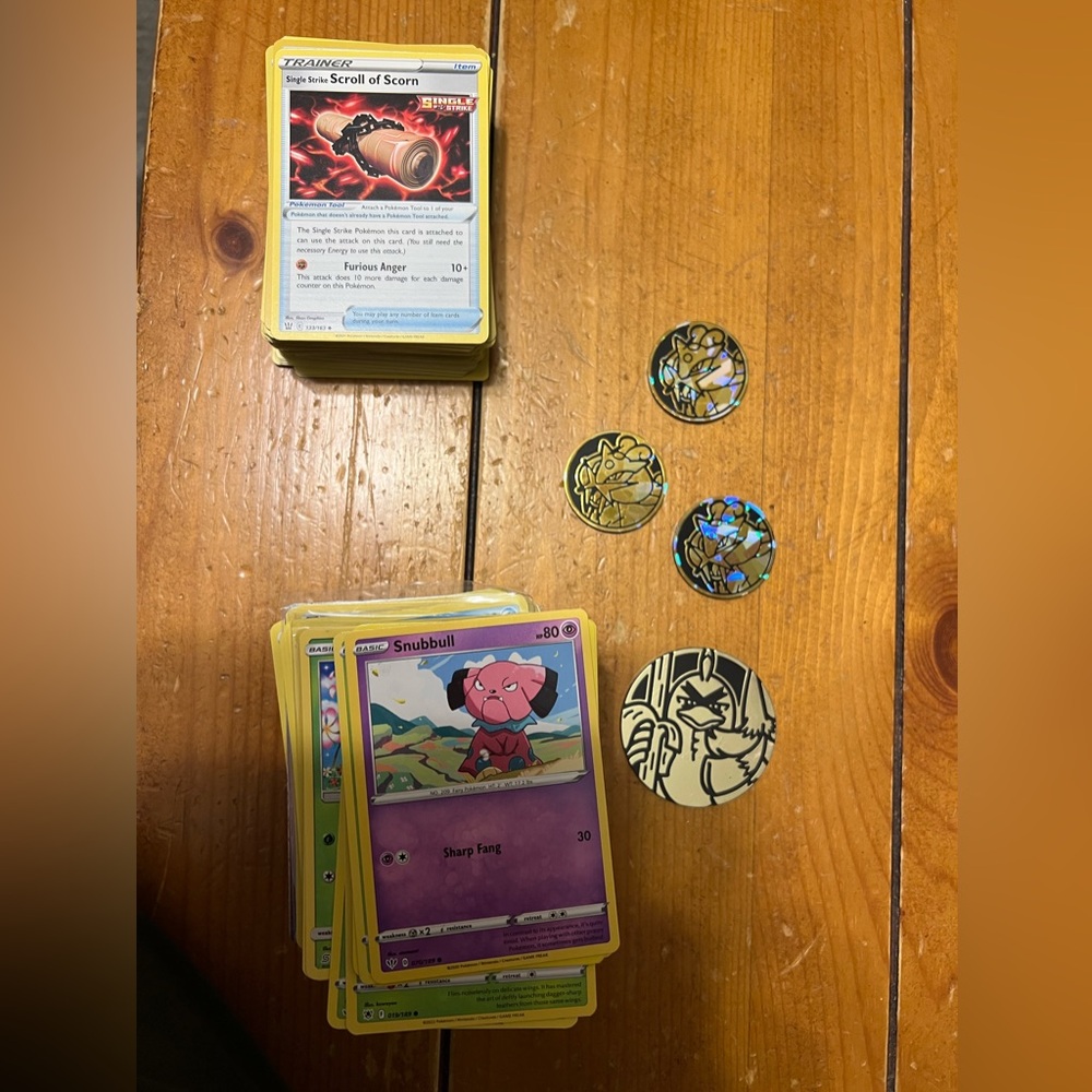 Assorted Pokémon Cards (300 cards) with 4 coins